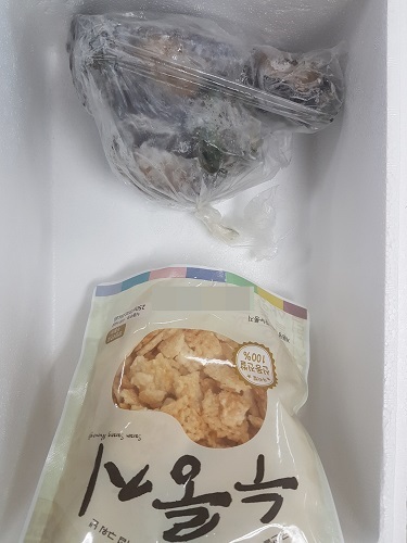 익산군산축협 이사 선거 출마 예상자가 유권자인 대의원들에게 준 전복과 누룽지