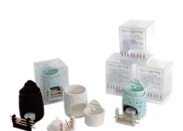 23회 공모전에서 금상을 수상한 정낭 품은 하르방. 현무암 모양의 돌하르방과 제주의 독특한 문화 정낭을 형상화한 캔들 홀더다. /사진 제공 = 제주도